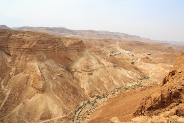 Judaean Desert mountain panorama with wadis seen from Masada fortress, Israel