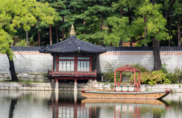 Traditional Korean style pavilion at pond in the garden of palace