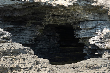 Natural background with a view of the cave in the rock
