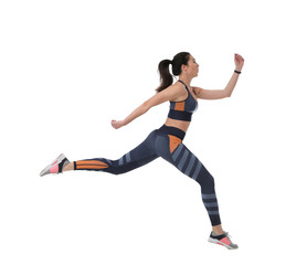 Athletic young woman running on white background, side view
