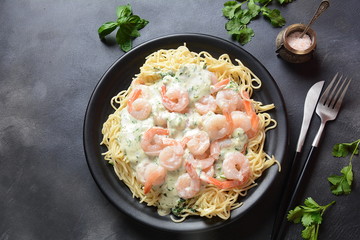 Italian Spaghetti or Pasta with shrimps, garlic and herbs in a creamy Alfredo sauce. Keto diet food concept
