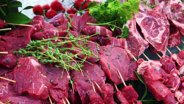 Rows of raw fresh lamb meat. Barbecue meat at a luxury resort for dinner. It is planned to have a barbecue party.
