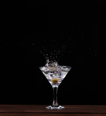 in a Martini glass olive flies
