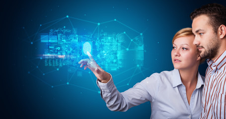 Man and woman accessing modern hologram personal database with fingerprint identification