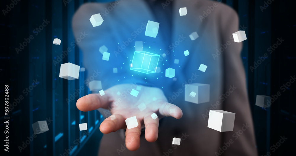Poster person holding hologram projection displaying white cubes in server room