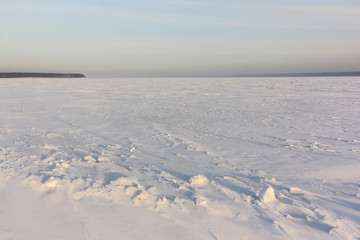 Snow on the frozen river in the winter, Ob reservoir, Novosibirsk, Russia
