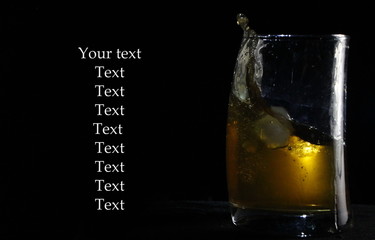 glass of whiskey with ice  and copy space