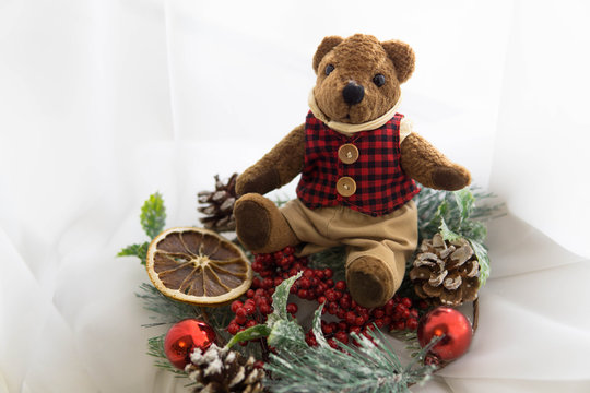 Merry christmas card teddy bear and new year wreath  