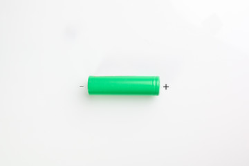 single green 18650 small hand tool battery with positive and negative poles identified on a white background