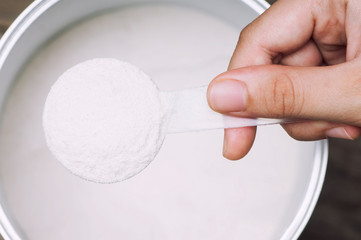 Close up of powder milk preparing