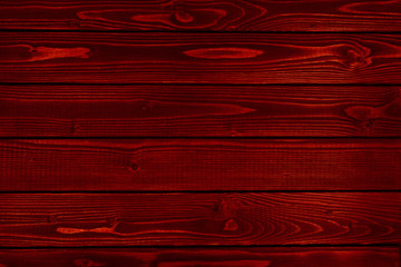 Red wood texture. Background old red panels. 