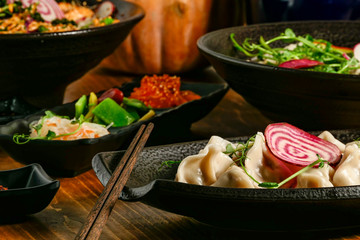 A dish of dumplings at an Asian restaurant