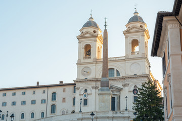 Fototapeta premium The church of the Santissima Trinita dei Monti - Roman Catholic late Renaissance titular church in Rome on the top of Spanish steps