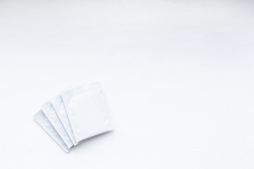 Teabag pack copyspace mockup advertising design. Tea pack on white background. White tea sachet mock up.