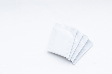 Teabag pack copyspace mockup advertising design. Tea pack on white background. White tea sachet mock up.