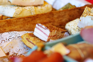 Selection of assorted home made meats, jerky and sausages on a farmer's market in Vilnius, Lithuania.