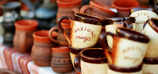 Ceramic dishes, tableware and jugs sold on Easter market in Vilnius, Lithuania