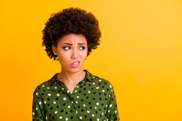 Close up photo of upset sad afro american girl look copy space hear friends summer holidays...