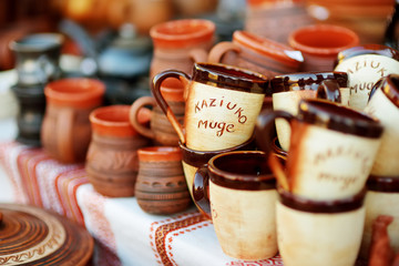 Ceramic dishes, tableware and jugs sold on Easter market in Vilnius, Lithuania