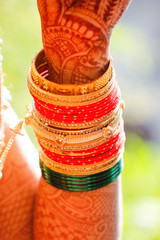 Traditional indian wedding ceremony, Bride wearing bangle and jewelry 