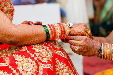 Traditional indian wedding ceremony, Bride and groom hand