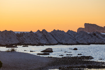 Fototapeta premium jagged rocks on Kornati islands after the sunset, Croatia