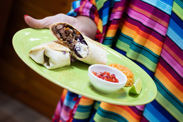 Burritos wraps with beef and vegetables. Beef burrito, mexican food.