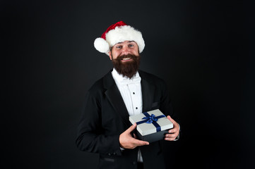 Gift for good employee. Happy businessman hold gift box. Bearded man smile with wrapped gift. Christmas gift. Boxing day. New year surprise. Office party. Holiday celebration