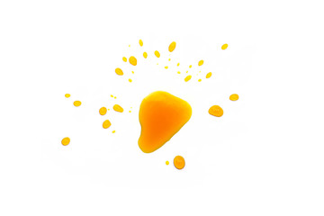 Puddle of orange juice, oil on white background, Sweet smudges splashes drops, drops of orange water, clipping path, top view                       