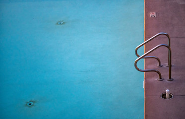 Swimming pool with no body at sunset