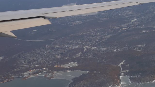 Aerial View of New York Through Airplane Window