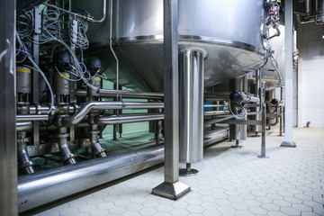 background of metal equipment and tanks on the food factory