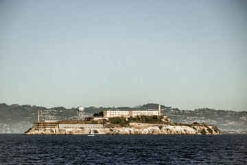 Fototapeta premium Alcatraz Island, former high-security prison also known as the rock, daytime, San Francisco Bay