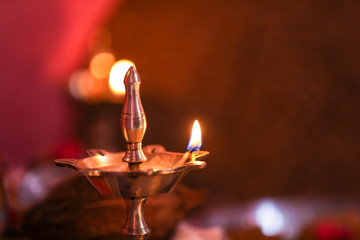 Traditional oil lamp with flame 
