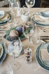 Luxury table setting for dining in pastel colors close up