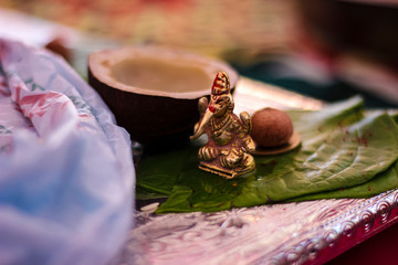 Dry coconut and lord Ganesha sculpture  