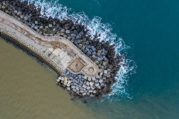 Concrete block cubes seawall and breakwater in Zumaia, Basque Country