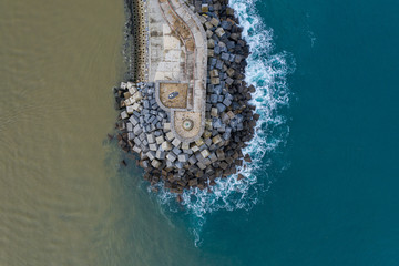 Concrete block cubes seawall and breakwater in Zumaia, Basque Country