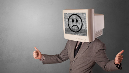 Young person with monitor head, old school smile concept