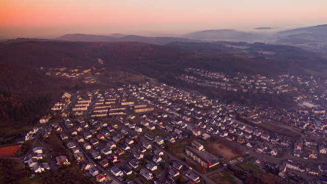 A city view of Herborn Seelbach in the evening taken by drone