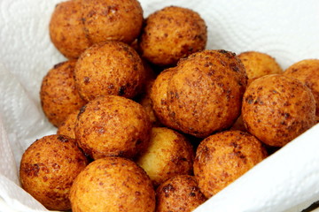 Cottage cheese balls. Small balls of freshly baked homemade cottage cheese fried hot oil. Freshly made donuts from cottage cheese