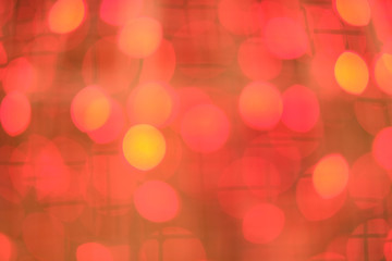 Red blur abstract background. bokeh christmas blurred beautiful shiny Christmas lights, Christmas background concept..