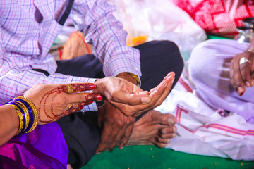 Indian engagement ceremony : Groom hand 