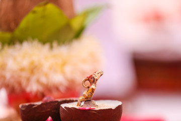 Dry coconut and lord Ganesha sculpture  