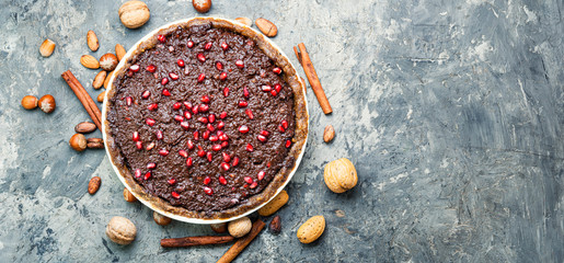 Obraz na płótnie Canvas Chocolate cake with pomegranate
