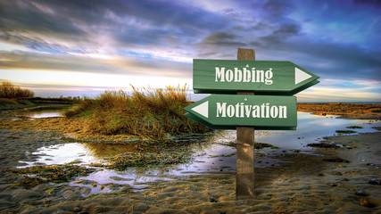 Street Sign to Motivation versus Mobbing