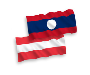 National vector fabric wave flags of Austria and Laos isolated on white background. 1 to 2 proportion.