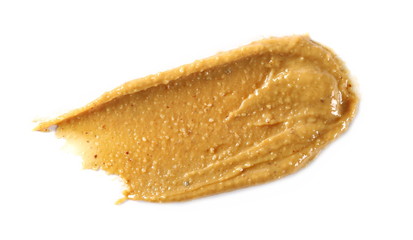 Peanut butter isolated on white background, top view