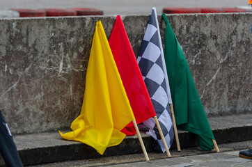 Racing flags at the car racing track