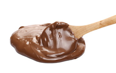 Cream chocolate spread with wooden spoon isolated on white background